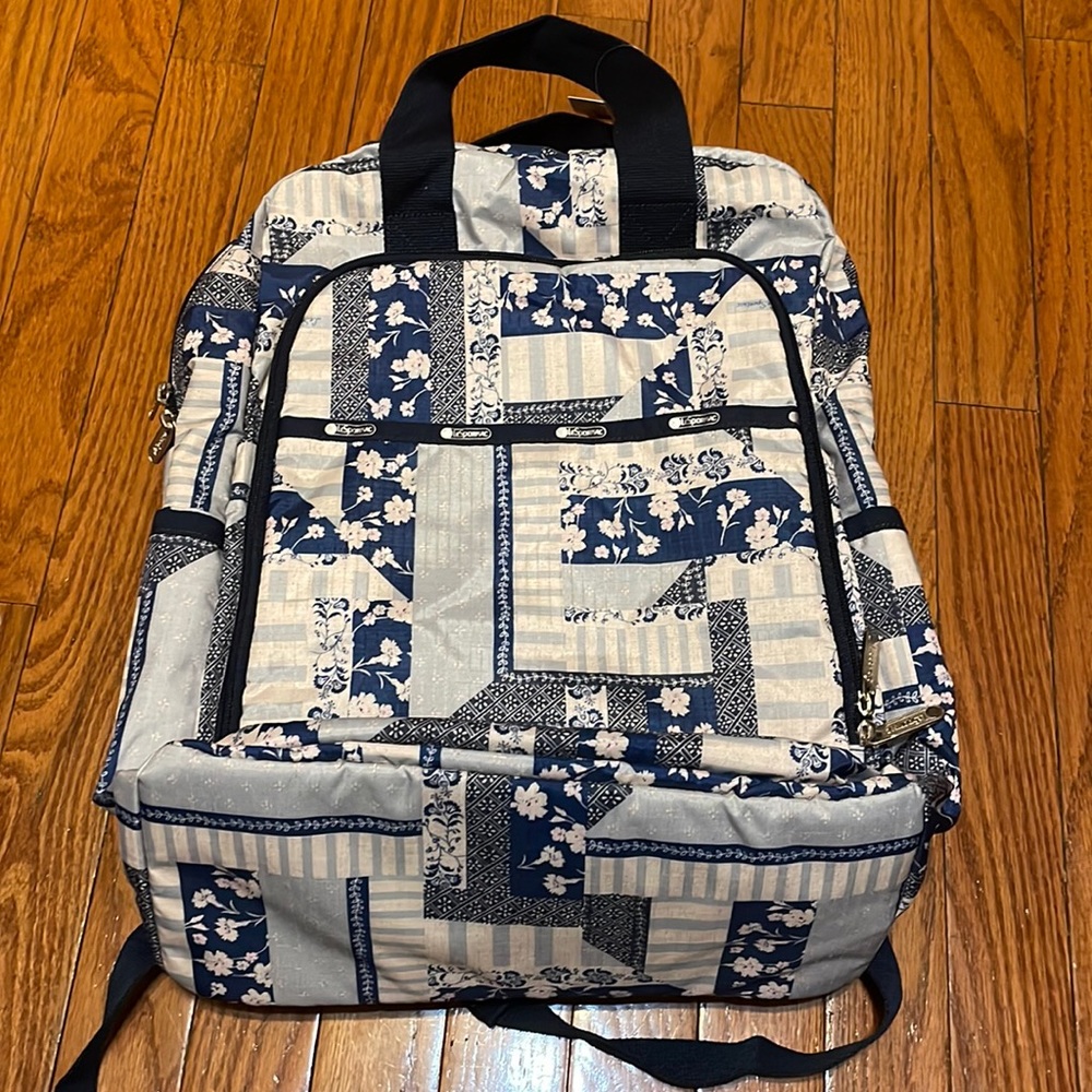 LeSportsac 4 piece nylon baby bag, blue floral print with pacifier pouch